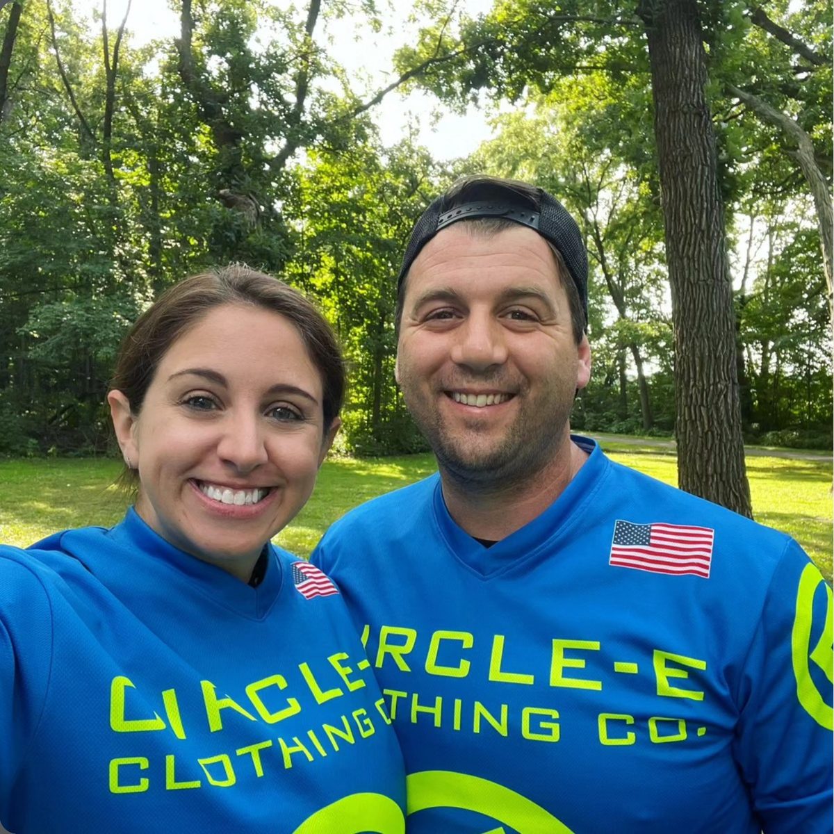 Two riders in Circle-E Clothing Co. team jerseys