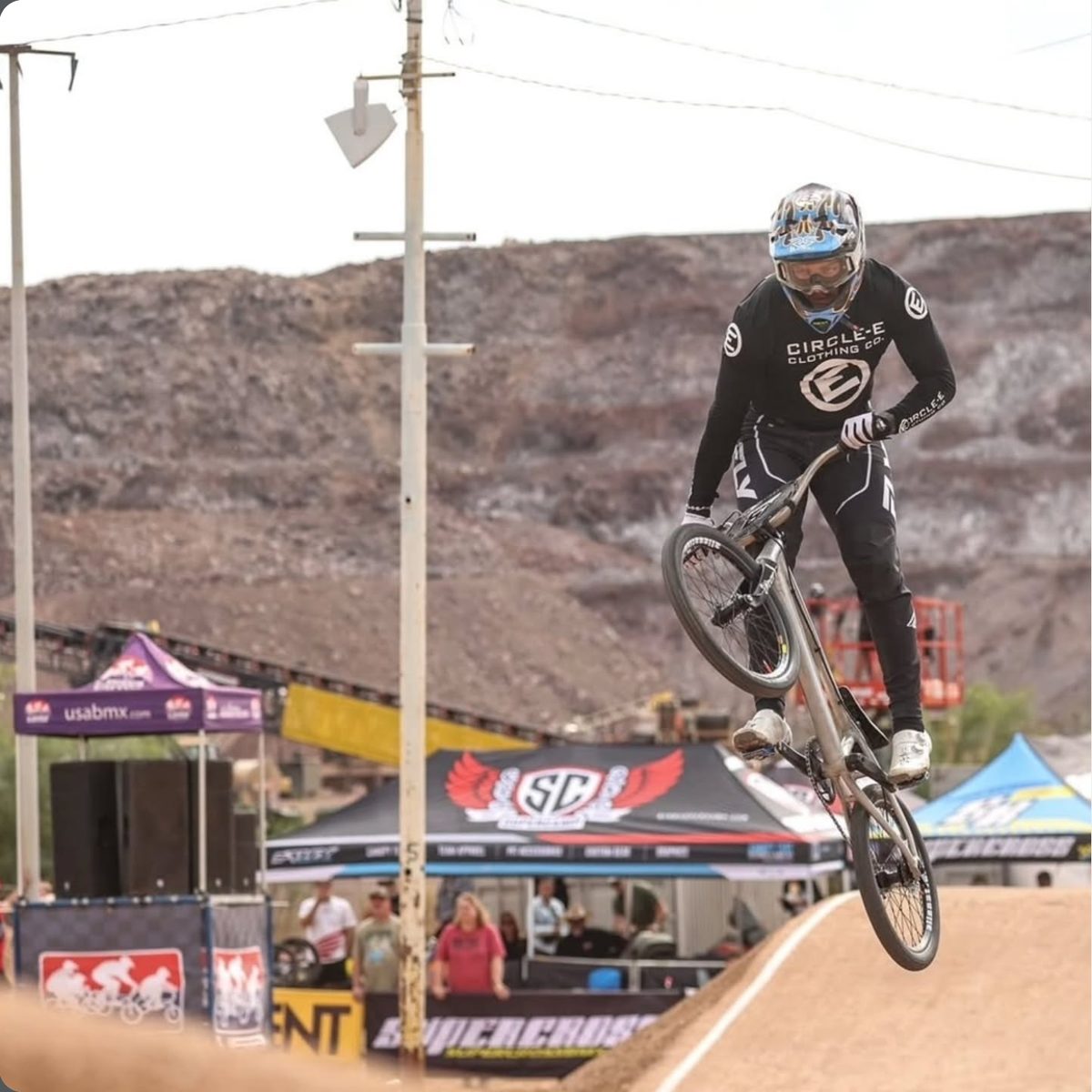 Rider in a Circle-E jersey at a race